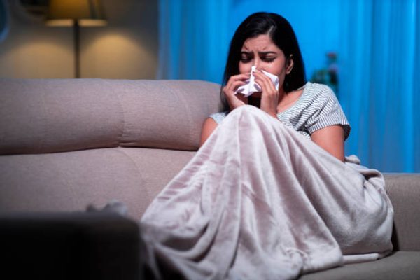 Young women, suffering, cold, flue, sick, night, India, Indian ethnicity,